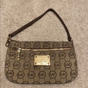 MK gold wristlet